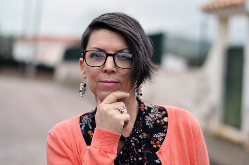 Black and orange adding colour with a bright cardigan